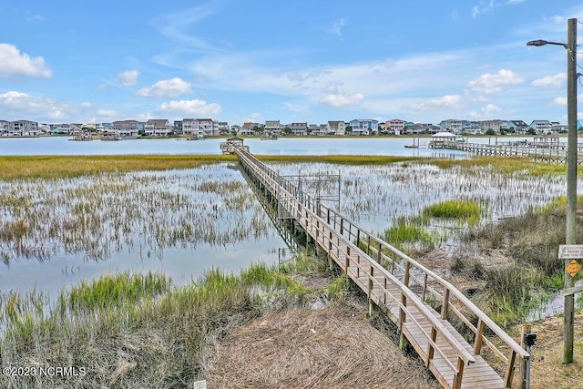 dock area featuring a water view