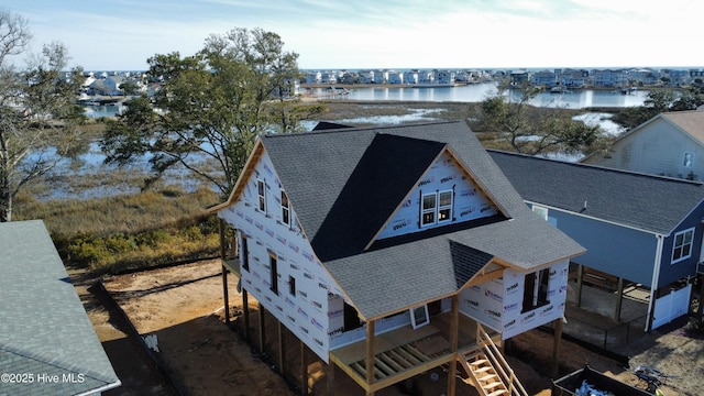 bird's eye view with a water view