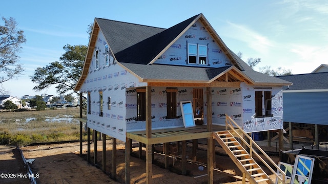 unfinished property featuring a water view