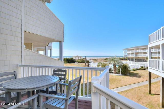 deck featuring a lawn