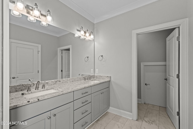 bathroom featuring tile floors, dual bowl vanity, and ornamental molding