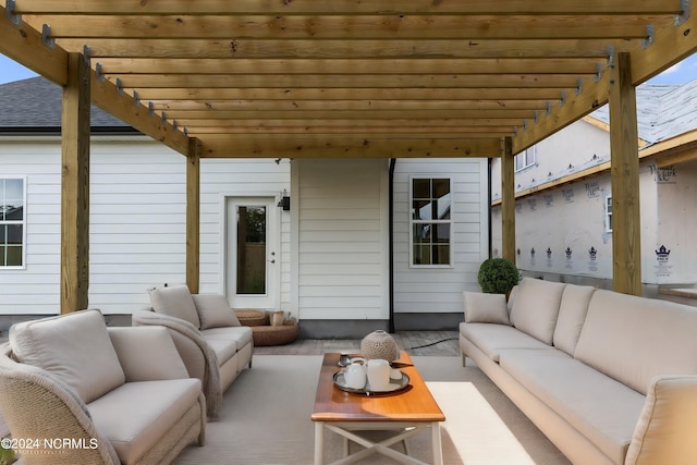 view of patio featuring a pergola and an outdoor hangout area