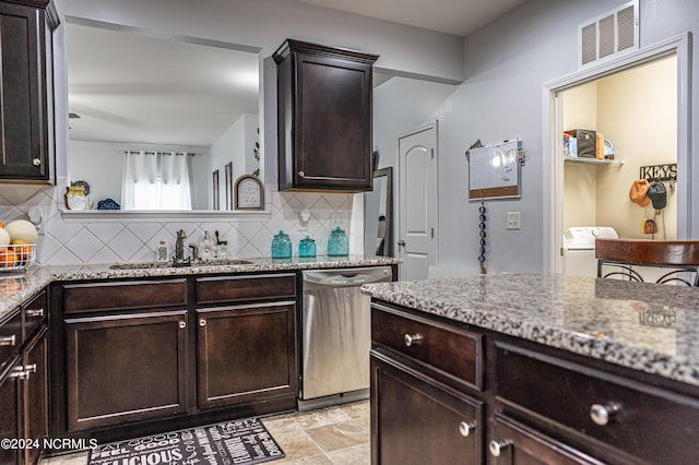 kitchen featuring decorative backsplash, dark brown cabinets, and dishwasher