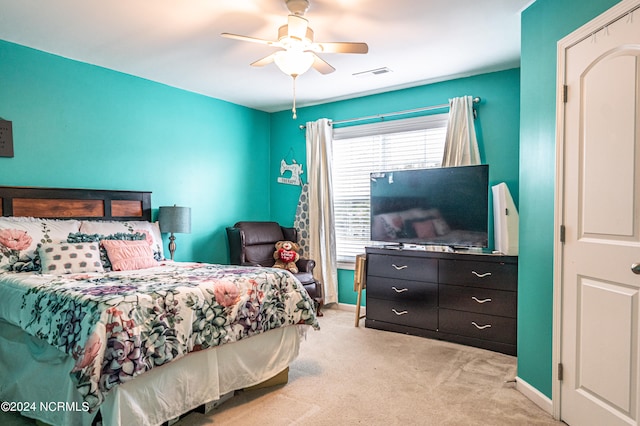 carpeted bedroom featuring ceiling fan