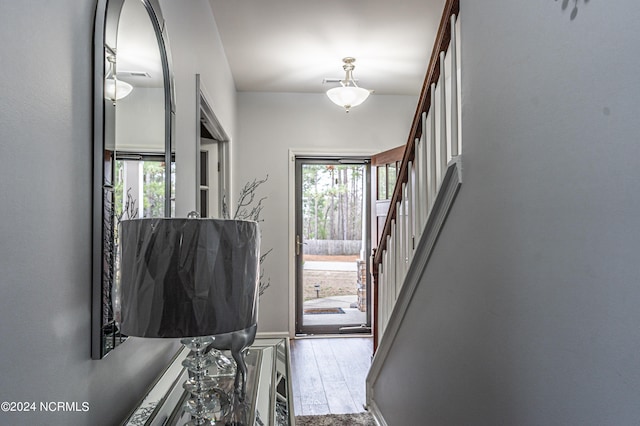 foyer entrance featuring hardwood / wood-style flooring