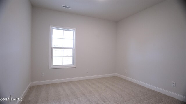 1254 Opaca Dr SE, Bolivia, NC 28422 - empty room featuring carpet floors and baseboards