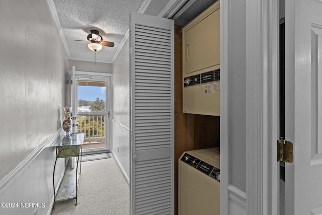 interior space featuring crown molding, a textured ceiling, and light colored carpet