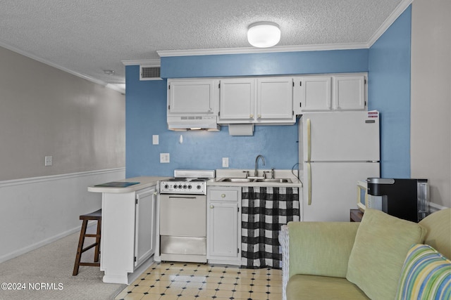 kitchen featuring sink, white appliances, white cabinetry, and light tile floors