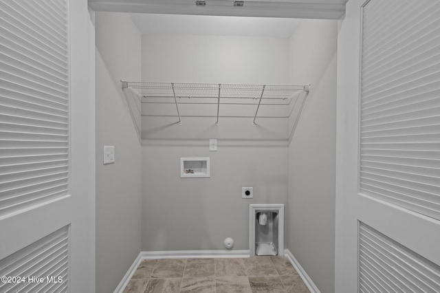 laundry room featuring hookup for an electric dryer, washer hookup, and gas dryer hookup