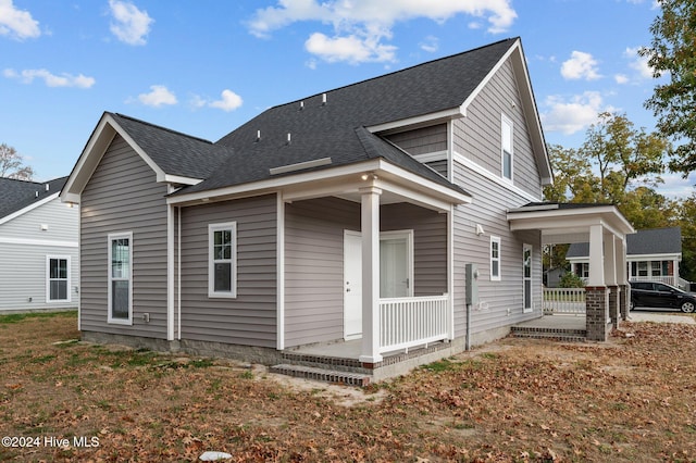 back of house with covered porch