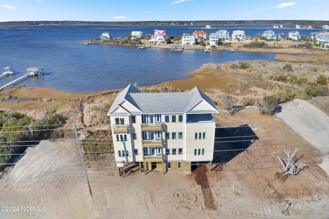 drone / aerial view with a water view