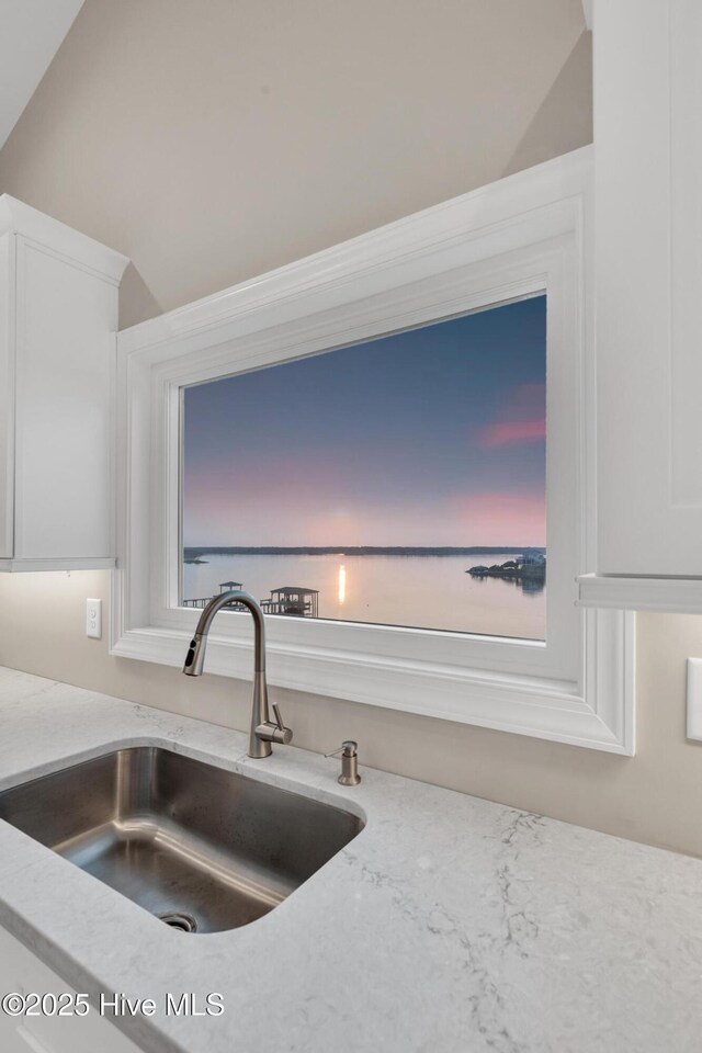 705 New River Inlet Rd, North Topsail Beach, NC 28460 - empty room featuring healthy amount of natural light, light wood-type flooring, and ornamental molding