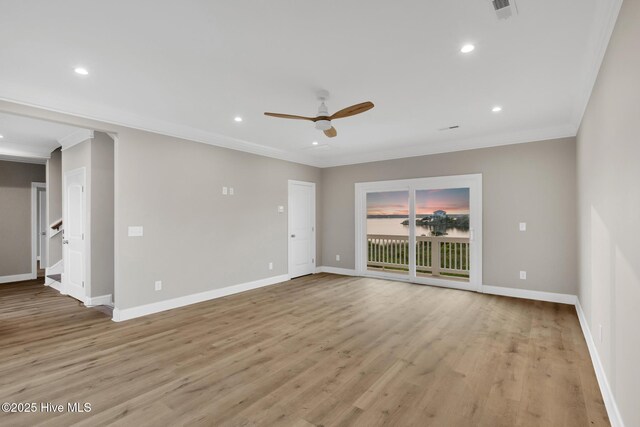 705 New River Inlet Rd, North Topsail Beach, NC 28460 - unfurnished room with a ceiling fan, crown molding, recessed lighting, and light wood-style flooring