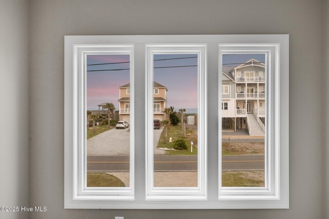 705 New River Inlet Rd, North Topsail Beach, NC 28460 - unfurnished bedroom featuring crown molding, carpet, and ceiling fan