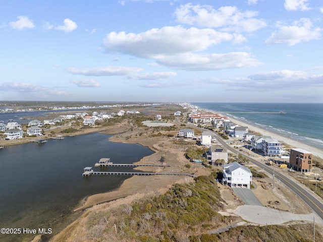 aerial view featuring a beach view and a water view