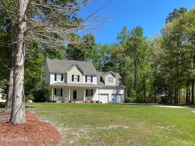 view of front of house featuring a front yard and covered porch