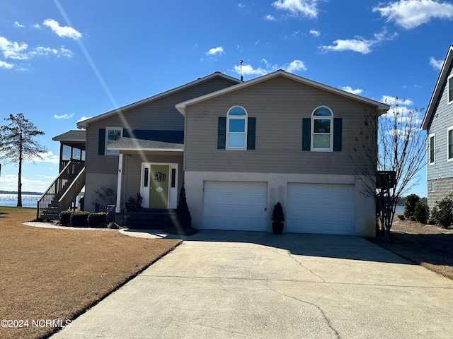 view of front of property with a garage