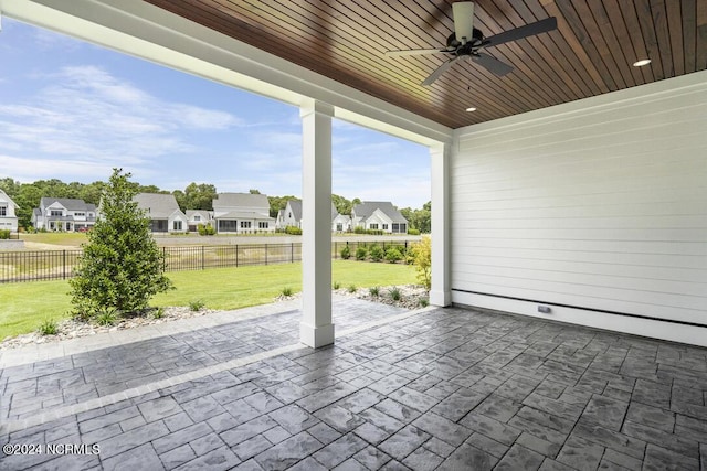 view of patio featuring ceiling fan