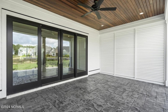 exterior space featuring ceiling fan and french doors