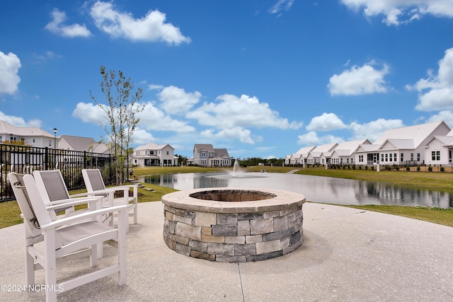 view of patio / terrace featuring a water view