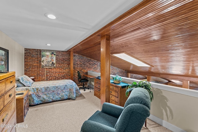 carpeted bedroom with vaulted ceiling, wood ceiling, and brick wall