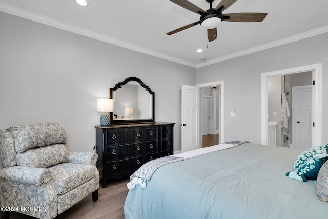 bedroom featuring wood-type flooring, ceiling fan, connected bathroom, and ornamental molding