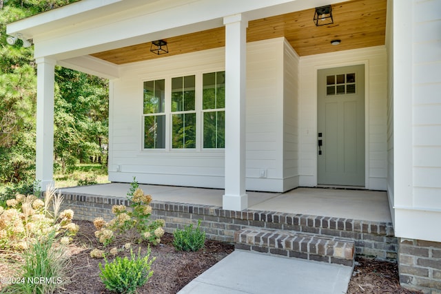 property entrance with a porch