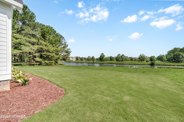 view of yard with a water view