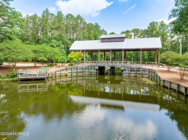 dock area featuring a water view