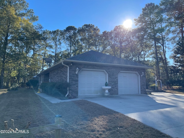 view of home's exterior with a garage