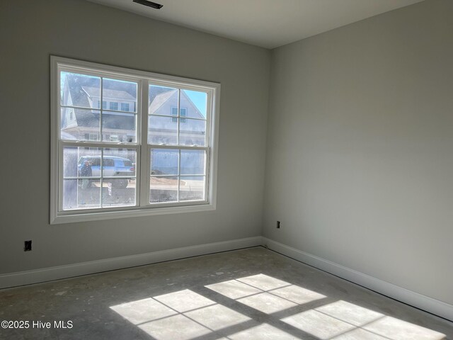 1204 Opaca Dr SE, Bolivia, NC 28422 - empty room with baseboards and plenty of natural light
