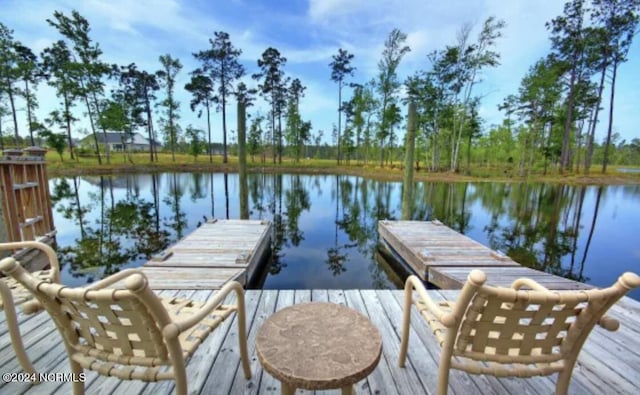 view of dock with a water view