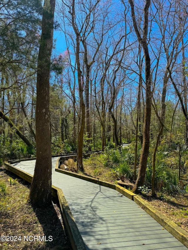 view of home's community with a forest view