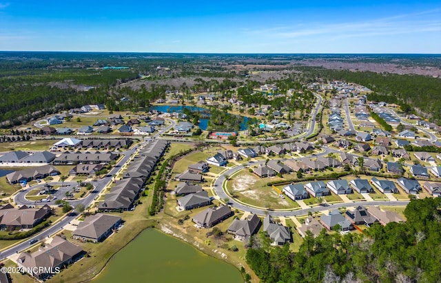 aerial view with a water view and a residential view