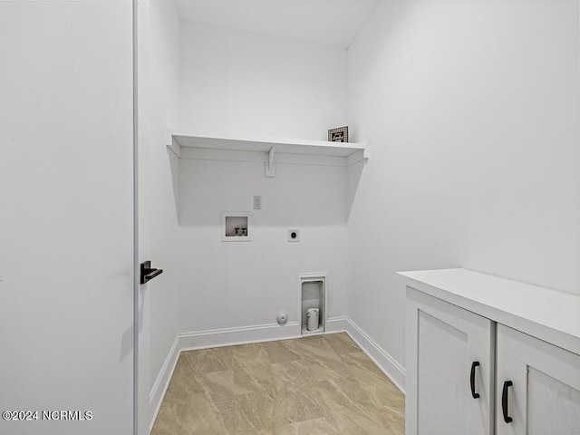 laundry room featuring hookup for a washing machine, gas dryer hookup, electric dryer hookup, laundry area, and baseboards