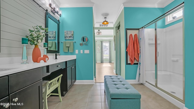 bathroom with tile patterned floors, visible vents, ornamental molding, and a stall shower