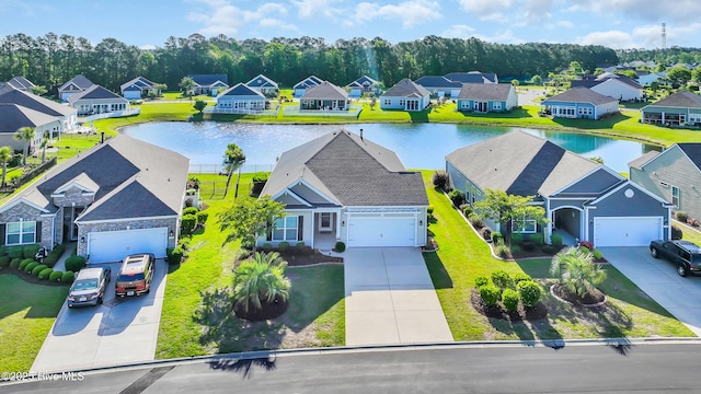 aerial view with a residential view and a water view