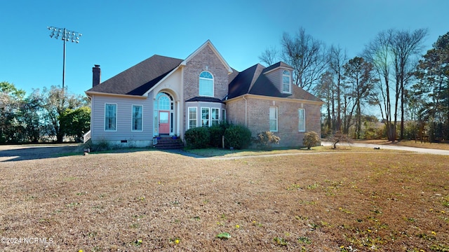 view of front facade with a front yard