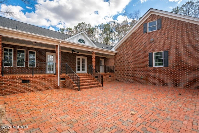 back of house with a patio area and french doors