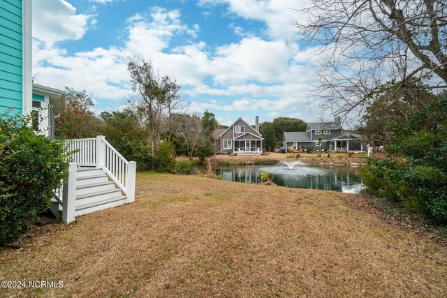 view of yard with a water view