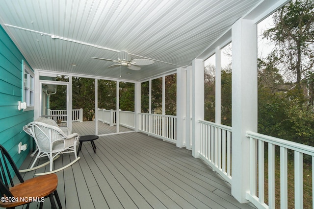 exterior space with ceiling fan