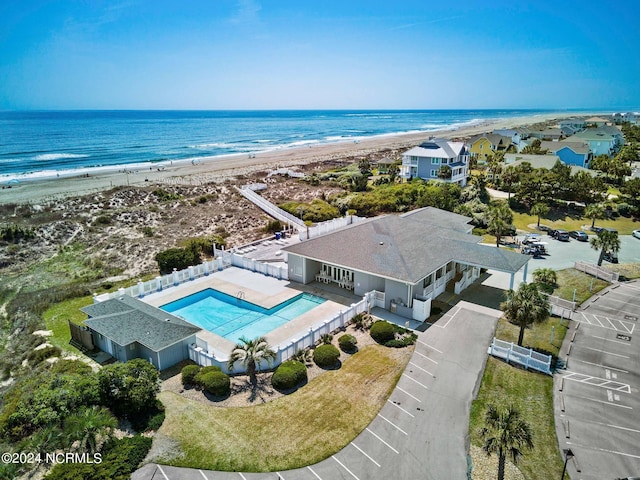 bird's eye view featuring a beach view and a water view