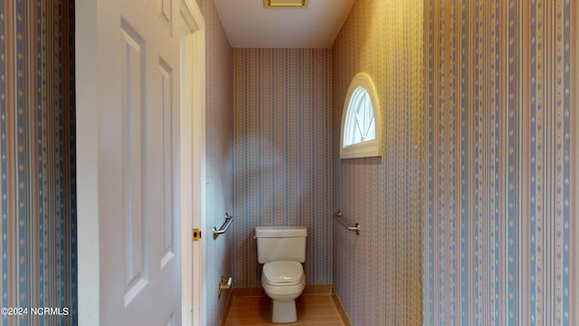 bathroom featuring toilet