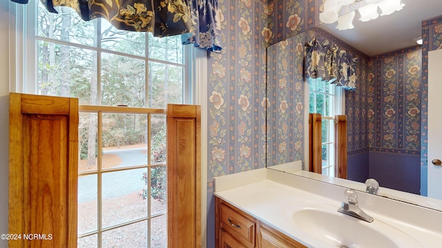 bathroom with a wealth of natural light and vanity