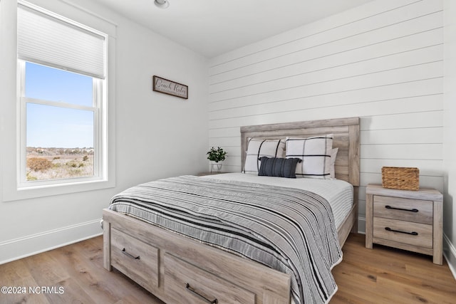 bedroom featuring light hardwood / wood-style flooring