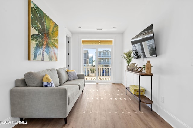 living area featuring hardwood / wood-style flooring