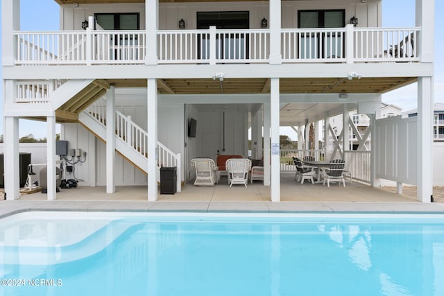 view of swimming pool featuring a patio area