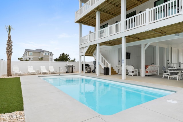 view of pool with a patio area