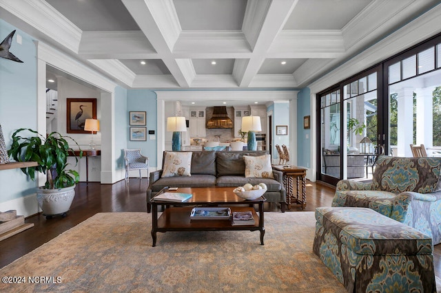 living room featuring ornamental molding, beam ceiling, coffered ceiling, and dark wood-type flooring