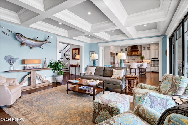 living room featuring coffered ceiling, beamed ceiling, dark hardwood / wood-style flooring, and ornamental molding